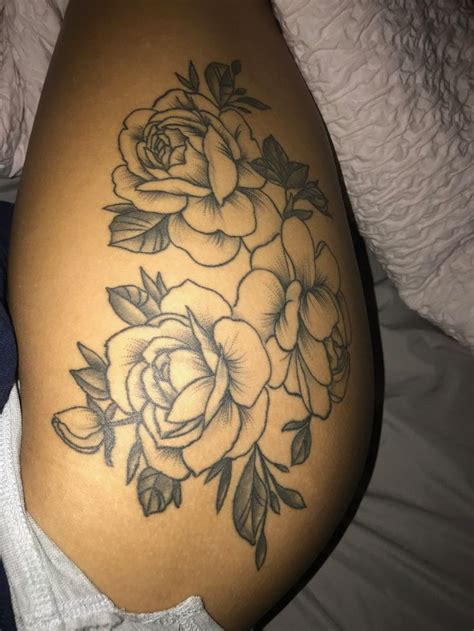 rose hip bum and thigh tattoos|Trendy Hip, Bum, And Thigh Tattoos: Designs And Placement Tips